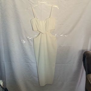 White dress with left and right cuts to the waist